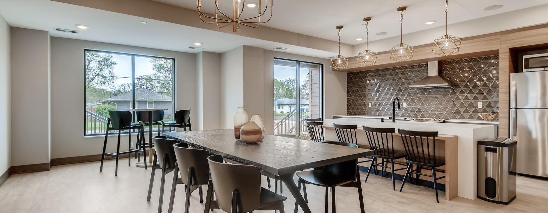a community kitchen with tables and chairs