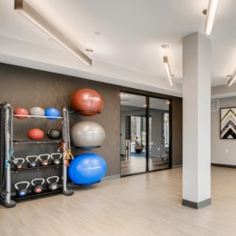 a fitness studio with exercise equipment